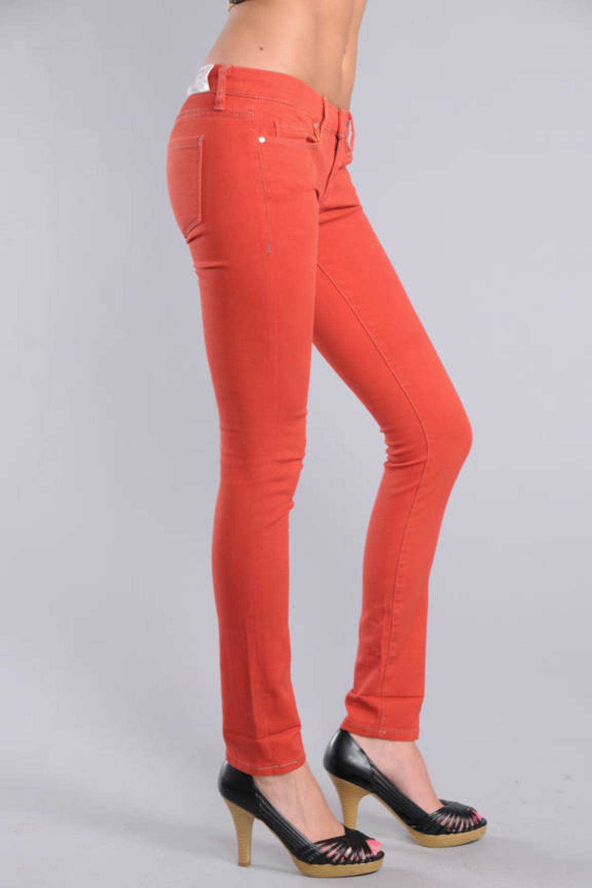 orange skinny jeans