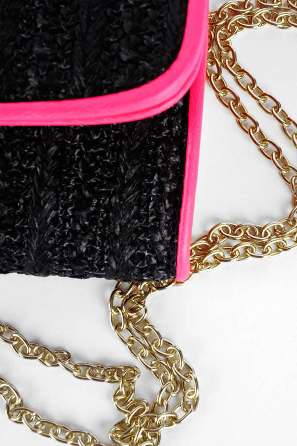 black woven clutch