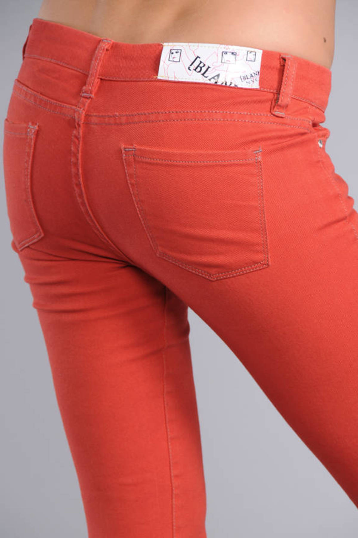 orange and black jeans