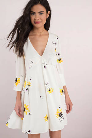 white and yellow floral dress